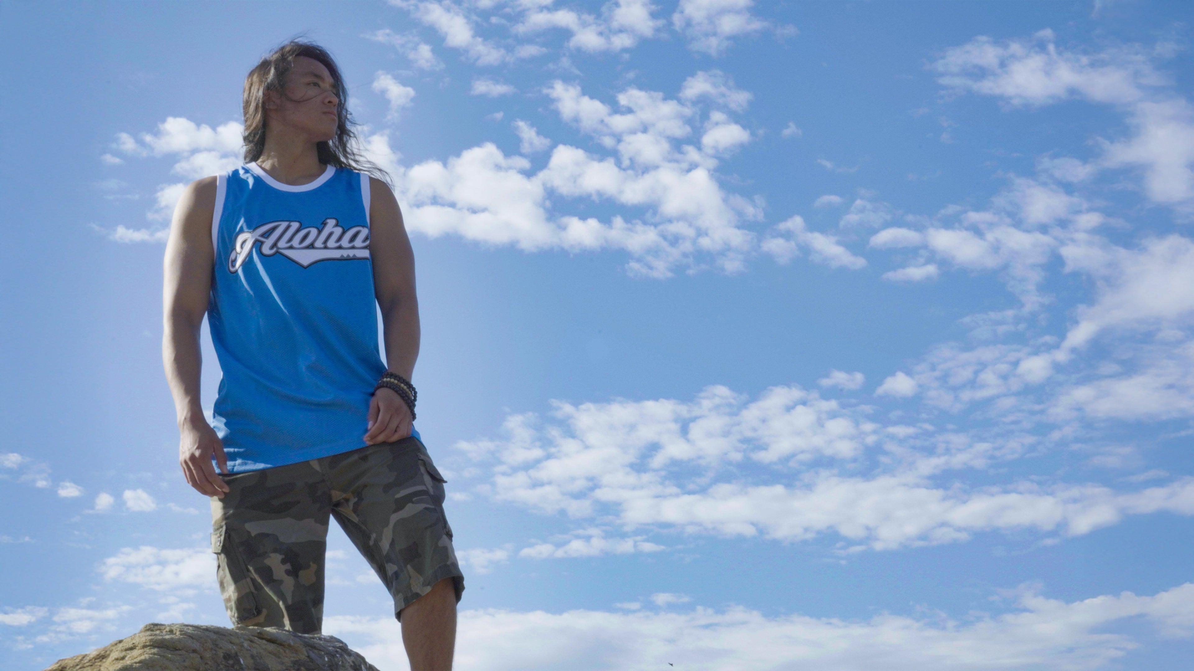 Kingman Roots red aloha jersey, black aloha jersey.